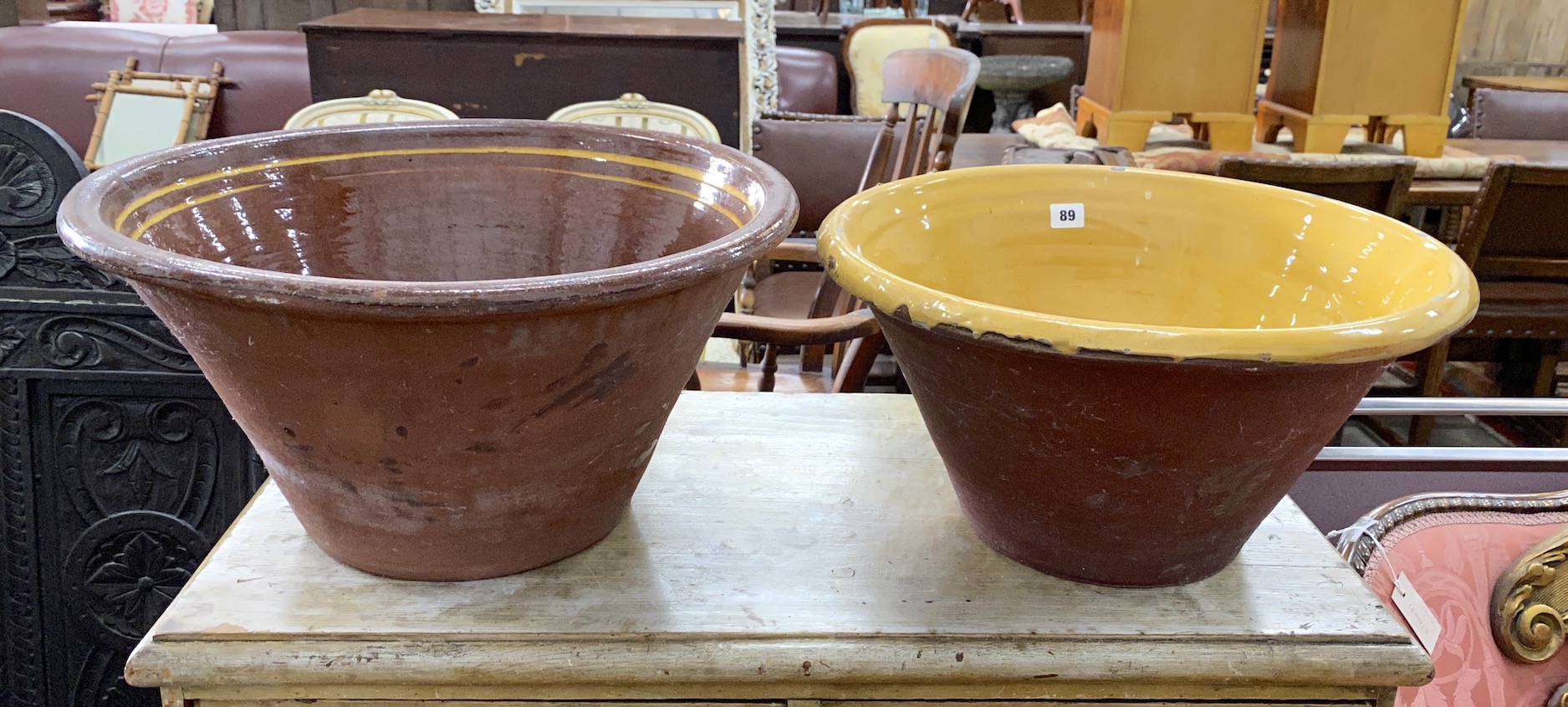 Two Victorian glazed earthenware circular dairy bowls, larger diameter 50cm, height 27cm